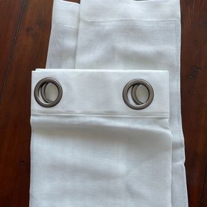 Four Pottery Barn sheer curtain panels